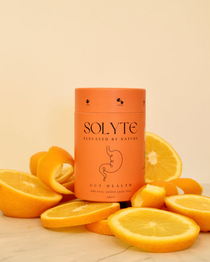 Organic Gut Health Loose Leaf Herbal Tea. Front View Oranges