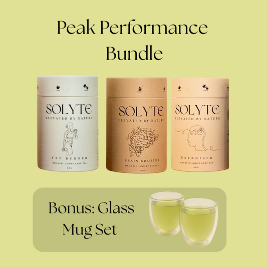 Three Solyte herbal loose leaf tea tubes with a bonus glass mug set on a light green background.